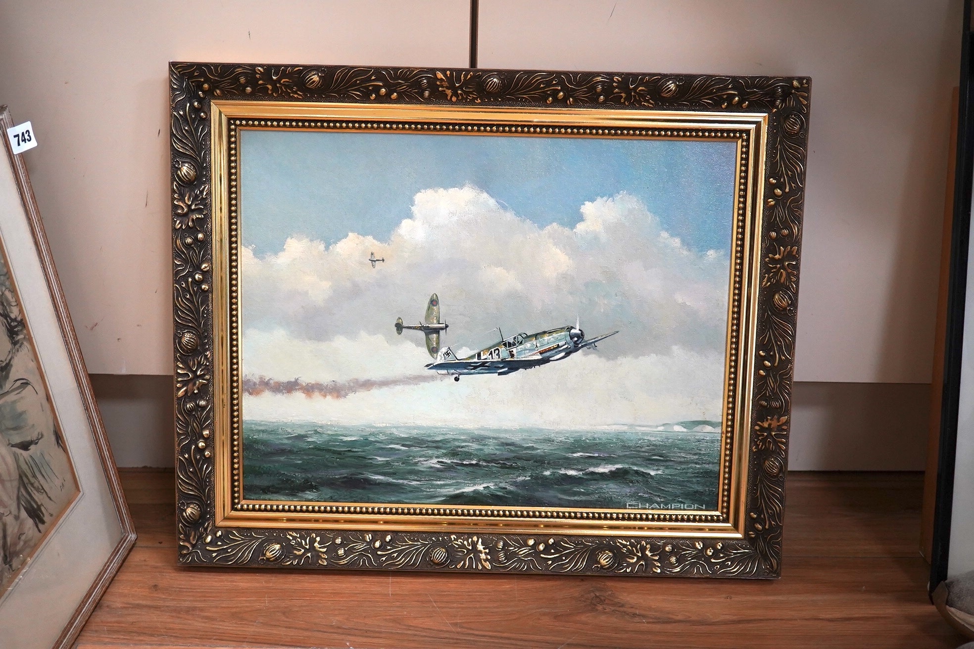 Champion, oil on board, ‘Spitfire chasing a Messerschmitt 109’, signed, 34 x 44cm. Condition - fair to good